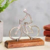 Transomnia Silver Metal Cyclist On Wooden Base Decoration -Campusgifts Shop transomnia decc715 silver metal cyclist on wooden base decoration lifestyle 1